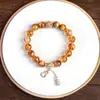 Nuevo Pulsera de Cristal Torre Amarilla con Perlas Estilo Chino, Sensación de Lujo Ligero y Gama Alta, Pulsera de Cristal para Mujer, Accesorios de Joyería de Calabaza Estilo Chino al por Mayor
