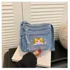 Bolso de mezclilla lavado bordado con gato lindo, nuevo, transfronterizo 2026, para mujer, versátil, con múltiples bolsillos, de hombro y cruzado