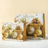 Bolsa de presente em estoque para atacado Árvore de Natal 2026 com carimbo dourado, bolsa vazia de alta qualidade festiva estrelada brilhante