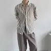 Camisa de rayas huecas retro americana de manga larga para hombre, diseño de primavera, camisa informal de rayas verticales con temperamento holgado