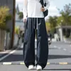 Moda de otoño e invierno para hombre, pantalones de trabajo deconstruidos modernos y únicos, pantalones de trabajo versátiles de estilo japonés con cordón, corte slim fit, holgados