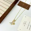 Collar Colgante Nuevo de Estrella y Luna de Circonita para Hombres y Mujeres Cadena para Clavícula Pequeña de Sol de Circonita Colgante de Moda Tendencia