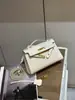 El Bolso Kelly de Segunda Generación Más Vendido de Xiaohongshu 2026 Nuevo Bolso de Mano Mini de Alta Gama Tendencia Bolso de Hombro Cruzado para Mujer