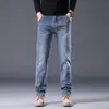 Novo Modelo Outono/Inverno 2025: Jeans Casual Versátil Slim-Fit de Perna Reta com Fecho Duplo, Versão Lisa