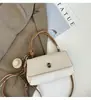 Bolsa de mão de design nicho estilo coreano, alto valor estético, bolsa pequena simples, bolsa transversal feminina, bolsa de ombro