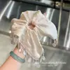 Selección PremiumElásticos elegantes y con estilo, nueva colección de accesorios para el cabello de nicho de alta gama para recoger el cabello en la parte posterior de la cabeza