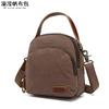 Mochila casual das mulheres mochila impermeável mochila de lona com bolsa de couro de primeira camada pequena cor sólida transbordamento fabricantes fornecimento