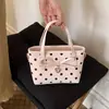 Bolso de mano con lazo y lunares estilo dulce y femenino para mujer, bolso de hombro y cruzado de lujo ligero para verano 2026 para salir y citas