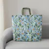 Bolsa para edredón de aire acondicionado en stock, personalizable con logo, tela no tejida engrosada impresa a color, botón a presión, bolsa portátil para almacenamiento de edredón y manta de verano