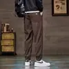 Calça de Veludo Cotelê Masculina Outono Inverno Afunilada Calça Jogger Masculina Calça Jogger Listrada Solta Casual Versátil Harem Calça Longa
