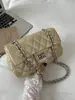 Bolsa de Ombro de Corrente com Strass para Mulheres 2026 Nova Moda Versátil Bolsa de Axila para Mulheres no Estilo Chanel com Textura de PU para o Dia a Dia Transversal