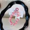 Popular llavero colgante de cuentas chapadas en colores de caramelo con lazo, llavero, accesorio para bolso, charm para funda de teléfono