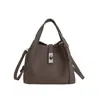 Bolso Pequeño Estilo Cesta de Verduras Simple para Mujer, Nuevo Bolso Cruzado Vintage 2026, Bolso de Mano Versátil de Primavera con Patrón de Lichi, Bolso Cubo