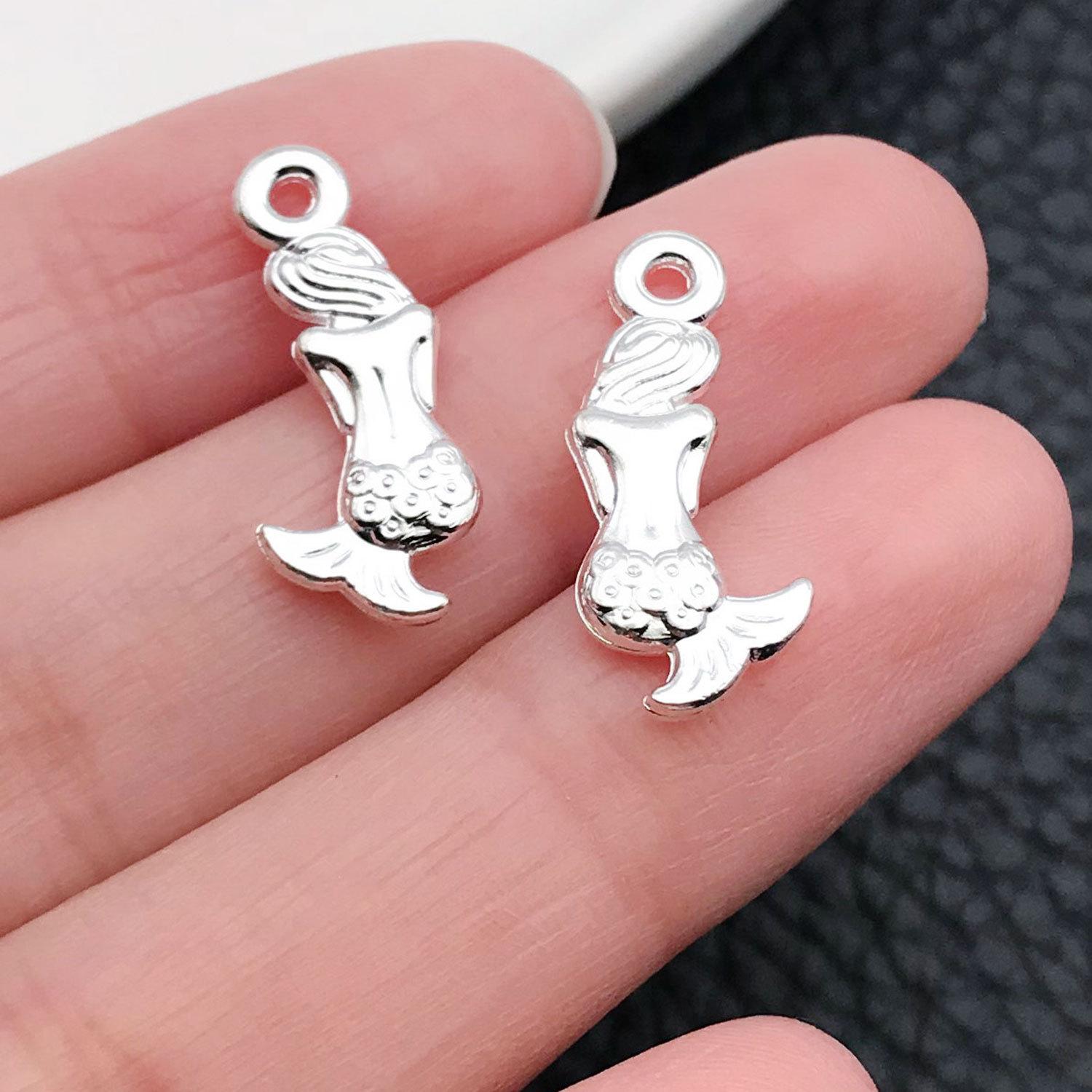 20702-M-亮银锌合金海洋美人鱼背影21x9mm-0.9