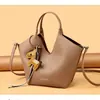 Bolso Cubo Casual de Nicho Estilo Coreano para Mujer 2026 Nuevo Estilo Minimalista Bolso Cesta Bolso de Hombro Simple para Mujer