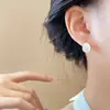 Aretes coreanos de plata estilo ojo de gato gota de agua para mujer, simples, a la moda, modernos, versátiles, con un toque de lujo ligero y de alta gama.