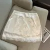 Foto Real do Novo Estilo Primavera/Verão Puro e Sedutor Estilo Pequena Mulher Saia de Renda com Tecido Liso e Barra com Acabamento em Renda para Mulheres