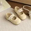 Zapatos de cuero para niños 2026 primavera y otoño nuevo estilo para niñas con ribete de encaje zapatos de una sola pieza suela blanda zapatos para bebé antideslizantes zapatos de moda