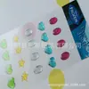Produção de figuras geométricas redondo quadrado triângulo amor flash laser cola adesivos plástico cristalino adesivos adesivos de orelha