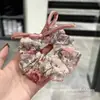 Goma para el pelo tipo lazo grande floral súper de cuento de hadas, liga para el pelo de alta gama para la parte trasera de la cabeza, accesorio para el pelo muy elástico y duradero