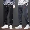 Pantalones Deportivos para Hombres Adolescentes 2025 Nuevo Primavera y Otoño Ajuste Holgado Patchwork Puños Pantalones Largos Casuales Pana Pantalones de Chándal
