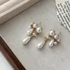 Pendientes de Borla Perla de Saturno de la Reina Madre del Oeste Pendientes de Tachuela con Diseño Personalizado de Moda de Lujo Ligero de Nicho para Mujer