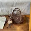 Diseño simple y único, bolso de mano retro de lunares, nueva colección de otoño 2026, elegante y de alta calidad, bolso de hombro de gran capacidad