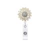 Clip para insignia con hebilla telescópica de fácil extracción, con diseño de flor de girasol de metal y diamantes incrustados de Amazon.