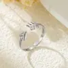 Moda Popular Europea y Americana Transfronteriza Anillo de Acero Inoxidable de Presión de Aceite Flecha a Través del Corazón Anillo Abierto Geométrico de Alto Nivel Arco y Flecha