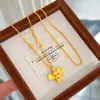 Colar de elefante auspicioso com orelhas grandes no mesmo estilo de influenciador do Little Red Book, luxo leve com sensação de alta qualidade, acessórios vintage retrô em ouro de areia atacado