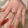 Anillo de Diamante Popular Estilo Coreano Simple de Cuatro Garras de Xiaohongshu, Normcore Clásico, Lujo Ligero, Anillo de Moda para Mujer, Una Pieza Envío Directo