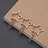 Venta al por mayor de fabricante de llaveros de estrella de cinco puntas, cierres en forma de ocho, placas de identificación de aleación de zinc chapadas en oro y plata, y dijes para bolsos