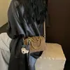 Super quente ombro só elegante padrão de corrente e diamante 2026 bolsa feminina bolsa transversal moda novo estilo outono通勤 niche textura