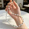 Collar Bohemio de Plata Pura con Concha Natural y Turquesa con un Toque de Lujo para Mujer