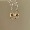 Aretes de aro estilo vintage con piedra de ojo de tigre dorada, únicos y hermosos, que exudan un encanto sofisticado y elegante, perfectos para mujeres