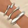 Accesorio transfronterizo de gran venta, producto nuevo: brazalete abierto de forma de ola irregular para mujer, conjunto de tres piezas personalizado y de moda de joyería para mujer