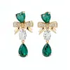Aretes de Gema Azul Océano Endurecida al Hielo Forma de Gota de Agua Lazo Corazón Estilo Dulce Aretes de Circonita Lujo Ligero Aretes de Alta Gama para Mujer