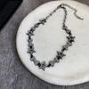 Hip hop oscuro dulce fresco Super Brillante pedrería estrella de cinco puntas hueso planeta letra aretes collar personalidad joyería europea y americana