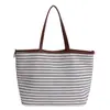 2025 Nueva Bolsa de Tote Rayada de Gran Capacidad de Nicho Coreano Moda Perezosa de Gama Alta Bolso de Lona Versátil para Viajar
