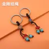 Cuerda tejida DIY hecha a mano, cuerda roja, cuerda amarilla, borla con patrón de nube, accesorios colgantes de llavero de moneda de los Cinco Emperadores, sensación de alta gama, venta al por mayor