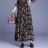 Saia estampada reversível para mulheres, nova saia xadrez vintage de corte A para outono/inverno 2026, cintura alta, afunilada, barra larga, moderna
