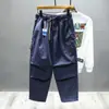 Marca de moda de otoño e invierno Pantalones casuales pesados americanos Pantalones tipo harén para hombre Cintura elástica Calle alta Sueltos Rectos Pantalones casuales para hombre