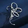 Broche de alta calidad, sentido de nicho, moda creativa, micro incrustación de circonita, ramillete, lazo de alta gama, accesorios elegantes para traje, venta al por mayor