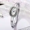 Pulsera de bañera de lujo reloj de mujer, forma ovalada nicho estudiantil popular transfronterizo reloj de pulsera de cuarzo de Xiaohongshu