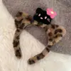Bonita diadema de gato con orejas de gato de piel negra, diadema de peluche de leopardo, accesorios para el cabello de dibujos animados.