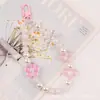 Pingente Chaveiro Laço em Forma de Coração Novo Estilo, Acessório de Flor de Resina com Contas Fresco e Simples, Capa de Fone de Ouvido, Decoração para Bolsa Feminina