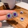 Joyería Zhuang Shengsheng, conjunto de pendientes y anillo con incrustaciones de circonita azul púrpura de imitación de paloma de estilo europeo y americano de lujo