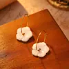Pendientes de flor impermeables de acero inoxidable 316 transfronterizos, diseño europeo y americano de trébol de cinco hojas, chapados en oro de 18k, pendientes de alta gama para mujer