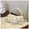 Bolsa de almofada de luxo francesa de nicho para o dia a dia Bolsa de nuvem com textura fofa coreana Bolsa de mão estilosa Bolsa de ombro Bolsa transversal