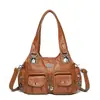 Bolsas de mano retro europeas y americanas, bolsas de motociclista, bolsos de hombro de nicho de tendencia transfronteriza, bolsos de mano de cuero suave estilo chica popular de moda